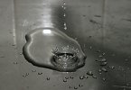 Water drop with splash